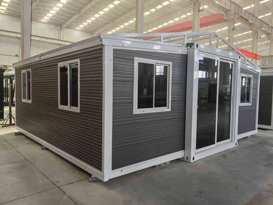 A 20ft expandable house with two stories, featuring windows and a door, designed in a modular style.