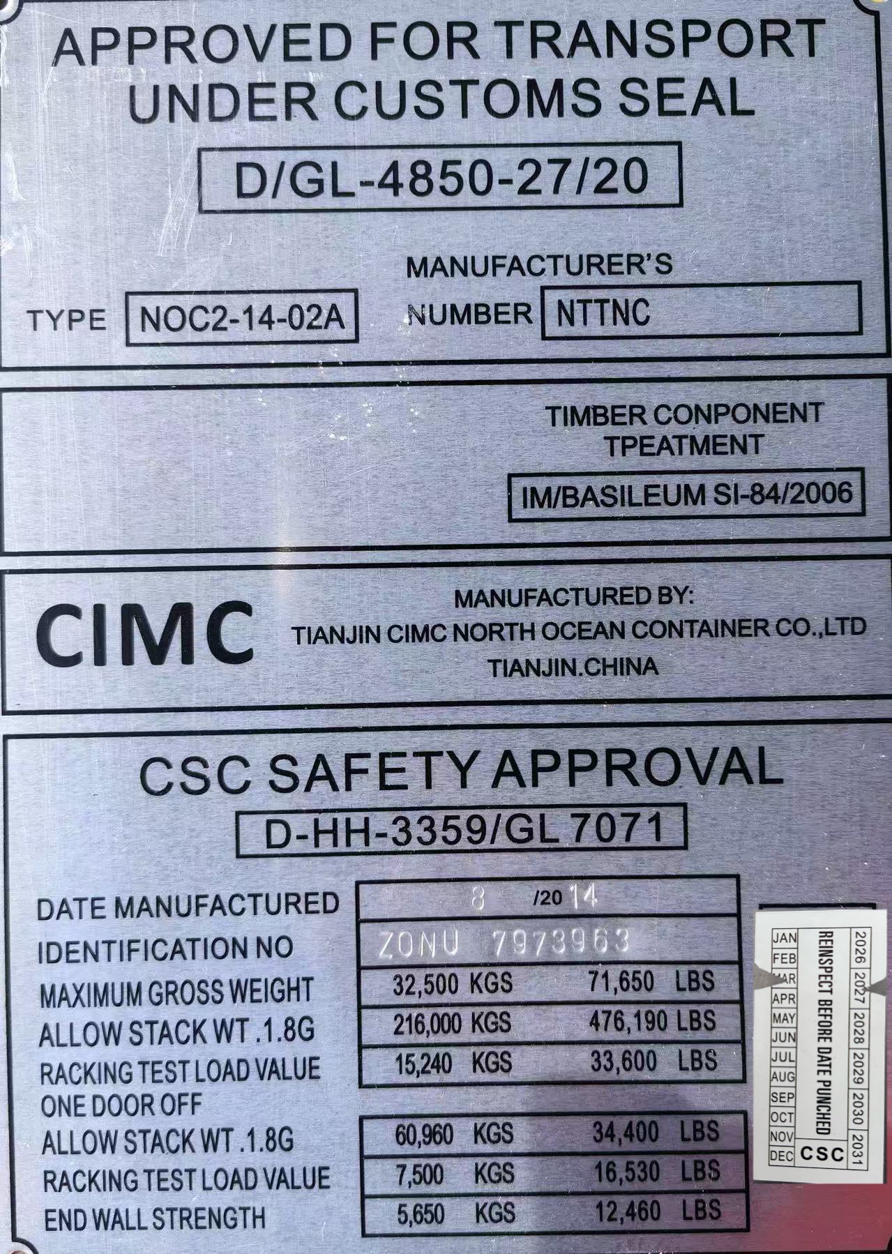 Metal label with text and specifications for a timber component treatment, including approval details and manufacturing information.