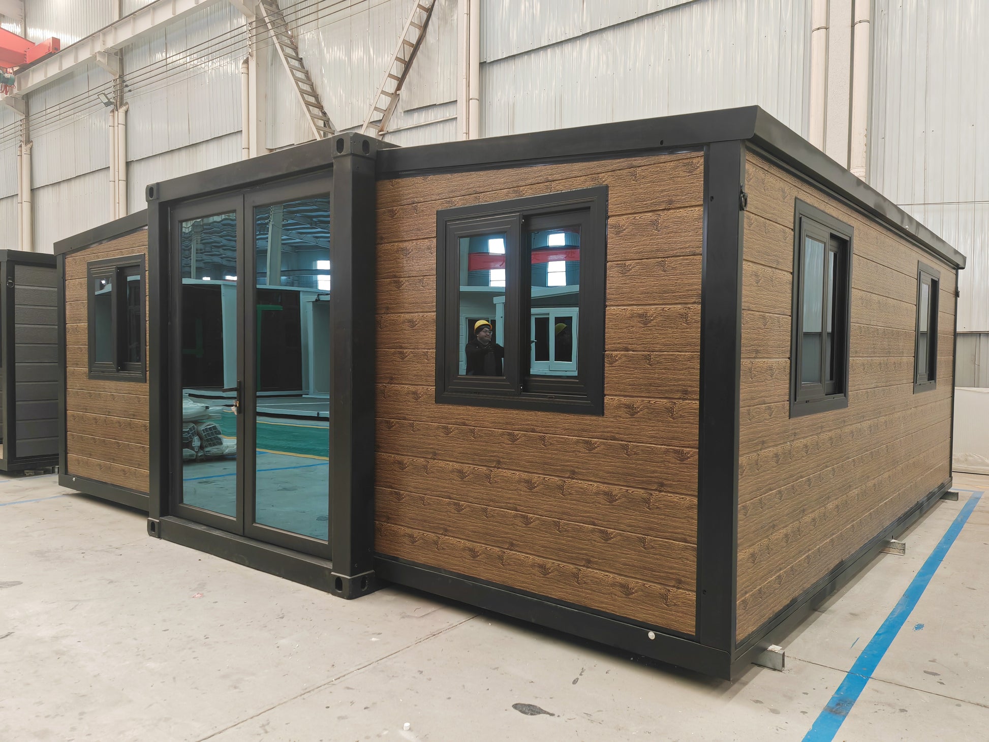 Modular wooden cabin with glass doors 