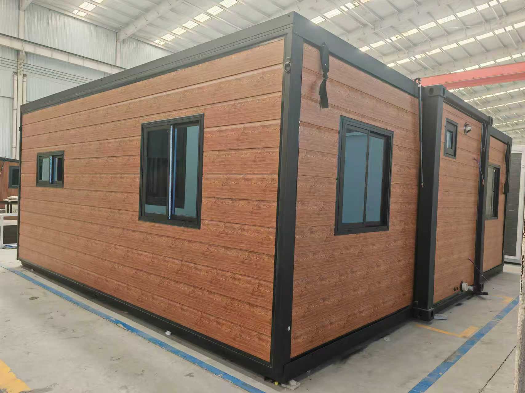 FE40 expandable homes with black frame and timber look cladding