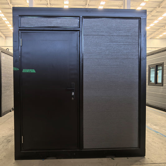 Black metal security door with a textured finish in an indoor setting bathroom